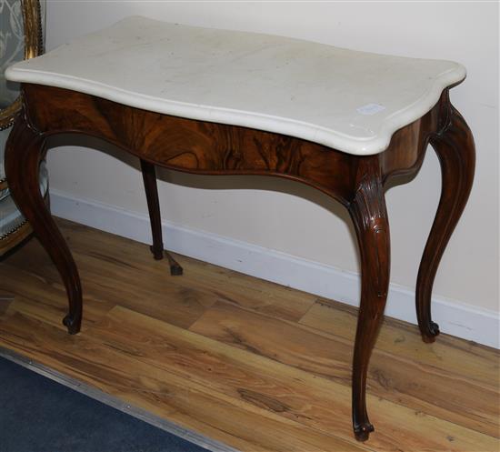 A Victorian marble topped walnut centre table, W.93cm